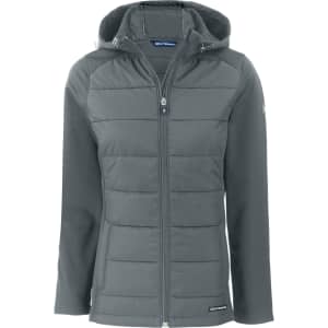 A grey eco hybrid jacket with a hood, featuring a zip front and quilted design. It includes a logo on the sleeve.