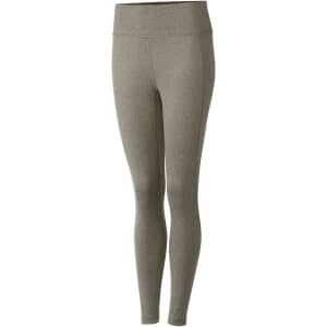Active leggings in a muted grey colour, featuring a fitted design and a smooth waistband. Includes a logo.