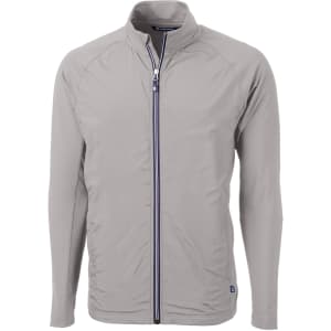 A full zip jacket in grey with long sleeves and a stand-up collar, featuring a logo.