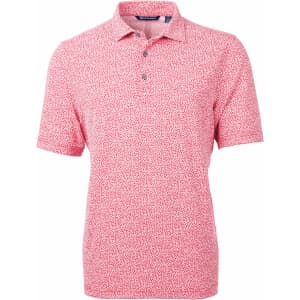 A red botanical print polo shirt with a collar and short sleeves. It features a logo on the chest.
