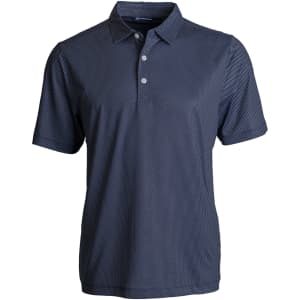 A navy polo shirt featuring a symmetry print design and a collared neckline. It has a logo on the chest.