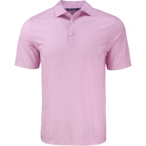 A pink polo shirt with a diamond dot pattern and a collar, featuring a logo on the chest.