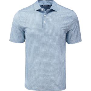 A light blue polo shirt with a diamond dot pattern and a collar. It features a three-button placket and branding.