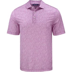 A short-sleeved polo shirt in pink with a floral print, featuring a collar and a logo on the chest.