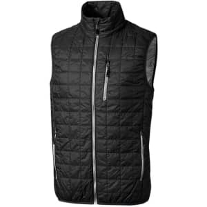 A black quilted vest with a high collar, featuring zippered pockets and a logo.