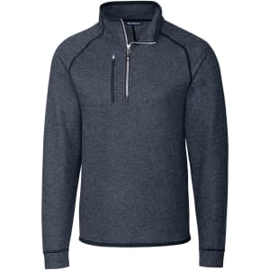A navy polar fleece half zip jacket featuring a collar and a logo on the chest.