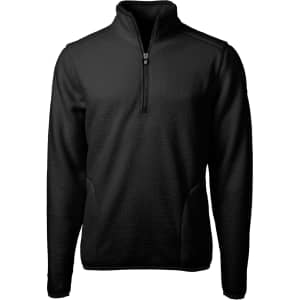 A black half-zip jacket with a textured surface and side pockets. Features a branding logo on the chest.