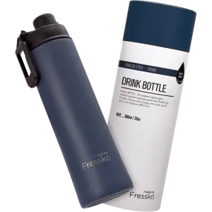 A drink bottle with a dark navy stainless steel body and a black cap, packaged with a cylindrical container.