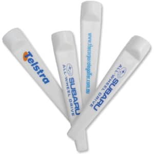 Four white golf tees, featuring branding from Telstra and Subaru, arranged at different angles.