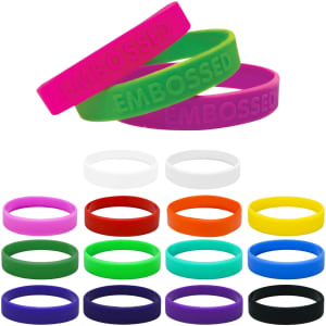 Colourful silicone wristbands in various shades, featuring embossed text. Includes purple, green, white, orange, yellow, and black bands.
