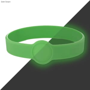 A dark green silicone wristband with a circular design element, featuring a glow effect.