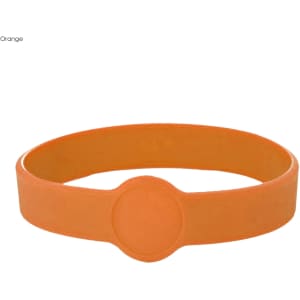 An orange silicone wristband featuring a central circular button and a smooth surface.
