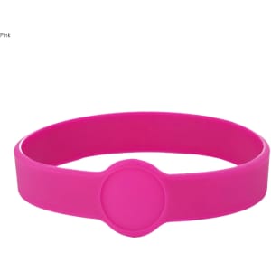 A pink silicone wristband with a central circular section, suitable for custom designs. Features a logo.