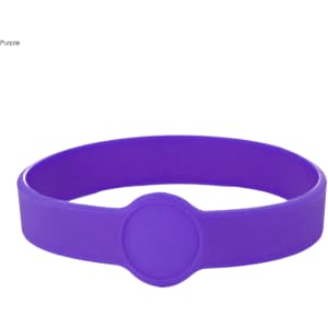 A purple silicone wristband featuring a circular design element and a logo.