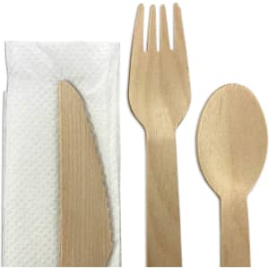 A wooden cutlery set featuring a knife, fork, and spoon, accompanied by a napkin. All components are light brown.