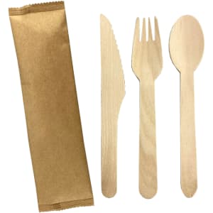 A wooden cutlery set featuring a knife, fork, and spoon, alongside a kraft paper wrapper.
