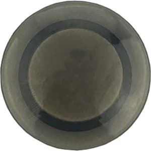 A round plastic button magnet in a dark grey colour, featuring a smooth surface and a central logo.