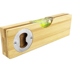 A drink bottle opener and leveller made of bamboo with a metal opening, featuring a spirit level.