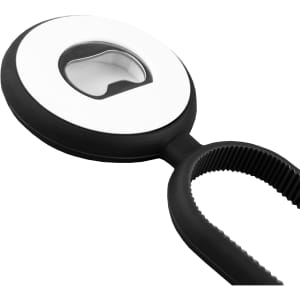 A drink bottle opener in black and white, featuring a circular design with a built-in bottle opener and a textured grip.