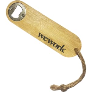 A bamboo bottle opener with a silver metal opener, featuring a branding logo and a natural finish.