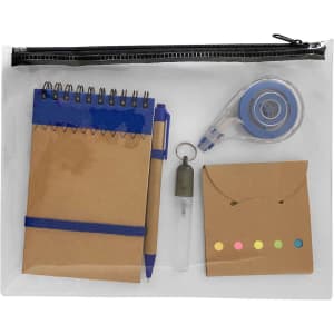 A clear pouch containing a notepad, pen, tape dispenser, a bell, and a set of sticky notes in pastel colours.