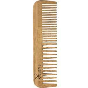 A bamboo comb with wide and fine teeth, featuring a logo on one side. The comb has a natural wood finish.