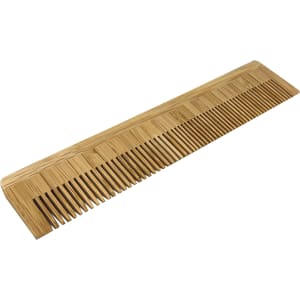A bamboo comb in a light wood colour with fine and wide teeth, featuring a simple design.