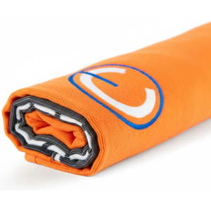 An orange beach towel rolled up, featuring a grey border and a circular logo.