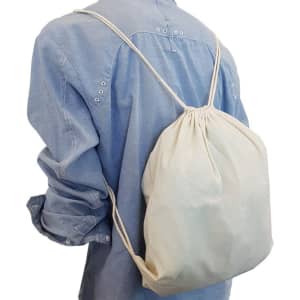 A cream drawstring bag is worn on the back, secured by matching drawstrings, against a light blue shirt.