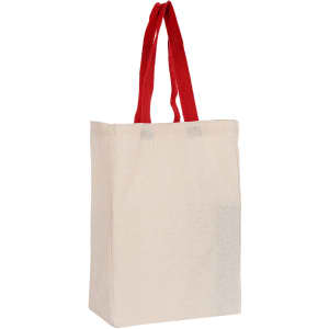 A natural-coloured tote bag with red handles, featuring a logo on one side.