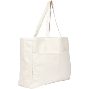 A large beige tote bag with two long straps and a front pocket, featuring a logo.