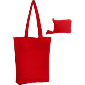 A red foldable calico tote bag alongside a small matching pouch. The bag features two shoulder straps and branding.