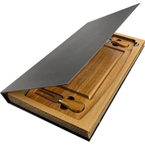 A wooden cheese board and knife set displayed in a black box, featuring a natural wood finish and utensils.