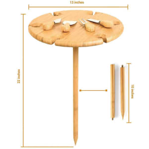 A bamboo outdoor party table with a round top, featuring a natural finish and measuring 13 inches wide and 22 inches tall.