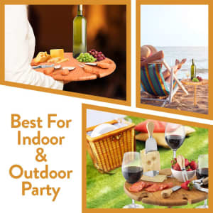 A wooden serving tray with cheese, grapes, and a drink bottle, accompanied by a picnic basket and outdoor chairs.