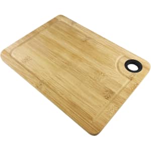 A bamboo cheeseboard with a smooth surface and a curved edge, featuring a round hole for easy handling.