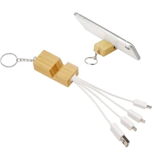 A bamboo phone stand with a key ring and multiple charging cables in white, designed for mobile devices.