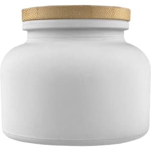 A white candle jar with a textured gold lid, featuring a simple and elegant design.