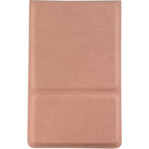 A compact mirror in a soft pink case with a textured finish and a logo.