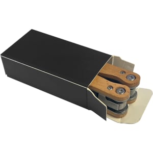 A compact knife with wooden handles, presented in a black box, featuring a logo on the packaging.
