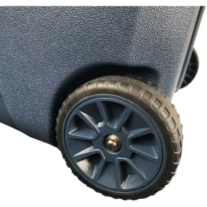 A dark blue cooler box with textured surface and a sturdy wheel for easy transport.