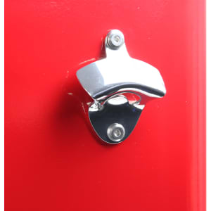 A chrome bottle opener attached to a bright red surface, designed for convenience in outdoor settings.