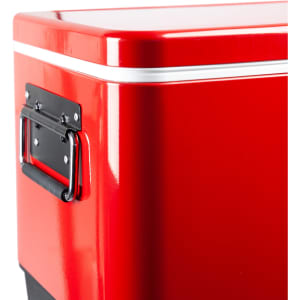 A red metal ice cooler box with a handle, featuring a shiny finish and a white stripe.