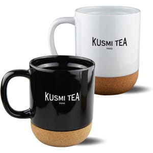 A coffee mug set featuring a black mug and a white mug with cork bases and a logo.