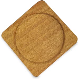 A wooden coaster in a square shape with a circular indentation, featuring a light brown finish.