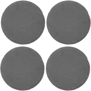 A set of four round slate coasters in dark grey, featuring a textured edge.