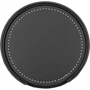 A circular black leather coaster with white stitching, part of a set of six. Includes a holder.