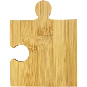 A bamboo coaster shaped like a puzzle piece, featuring a smooth finish and natural wood grain. It has a branding logo.
