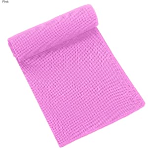 A pink cooling towel rolled out flat. It has a textured mesh design and features a logo.
