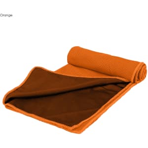 An orange cooling towel rolled out, featuring a textured side and a smooth reverse side, with a logo present.